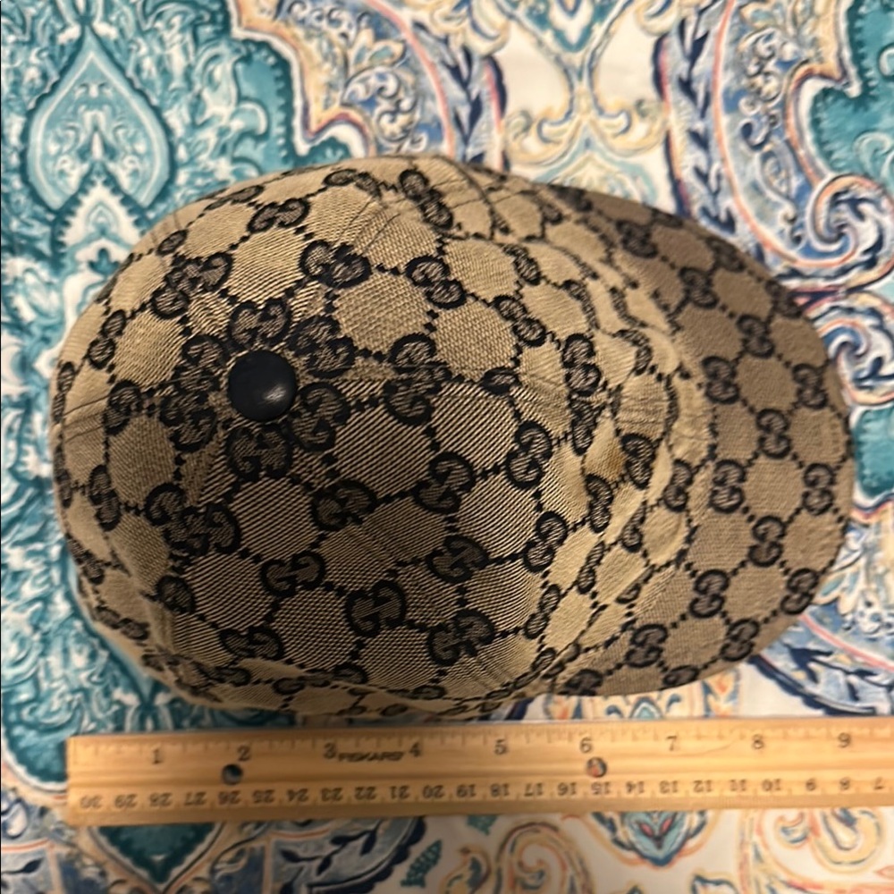 Authentic Gucci Kids Navy Blue and Tan GG Monogram Hat used.